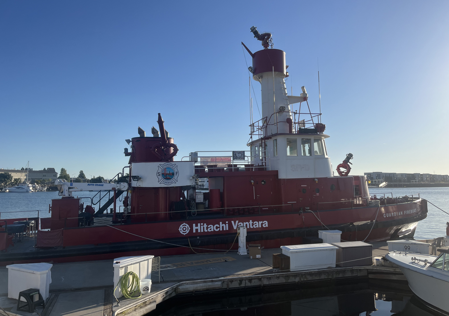 Fireboat at dock at sunset